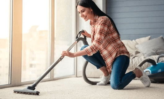 Woman cleaning her house | Carpet Town